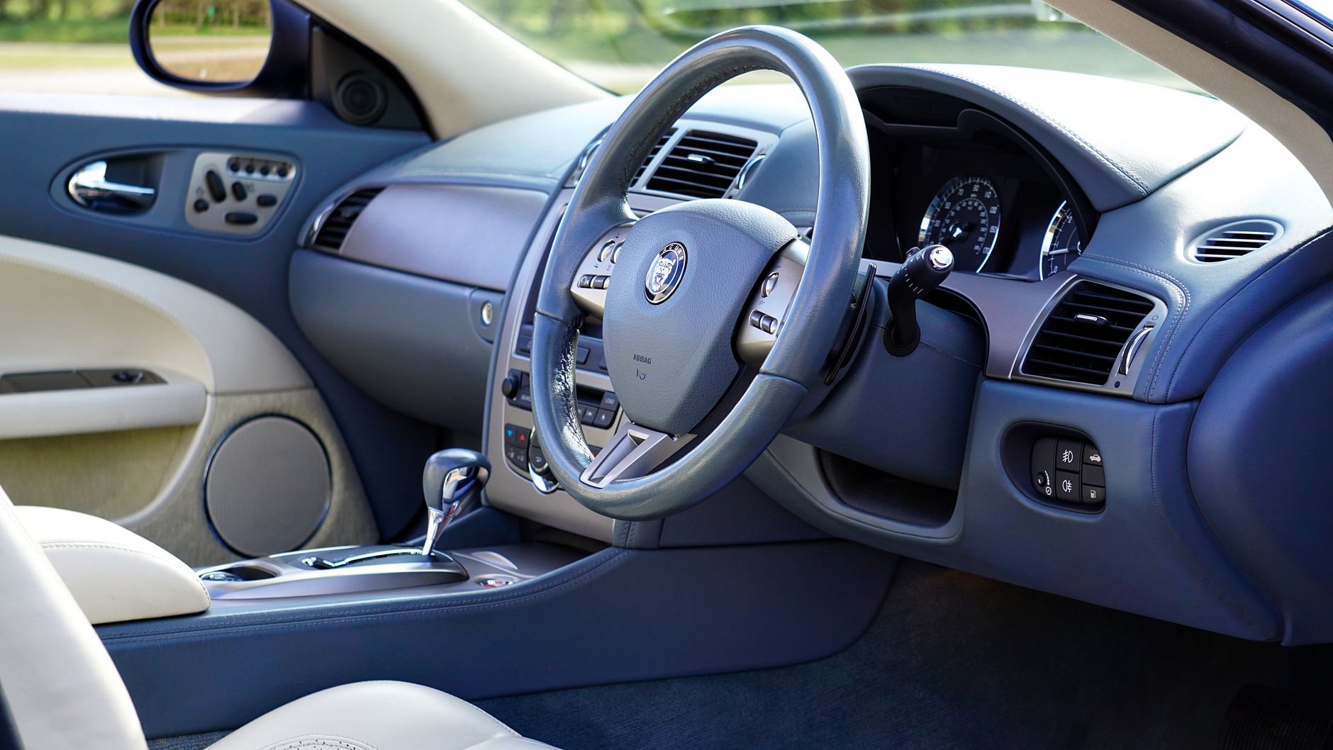 Premium vehicle interior — automotive purchasing consulting
